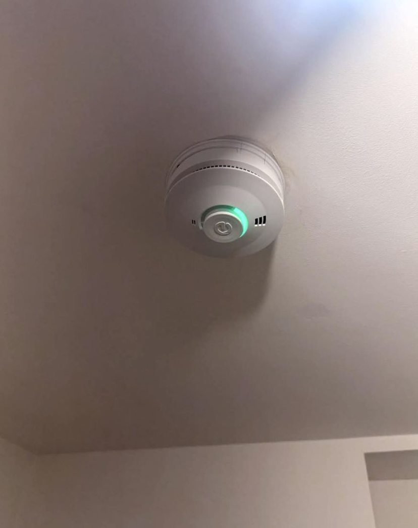 Mains smoke alarm on a ceiling
